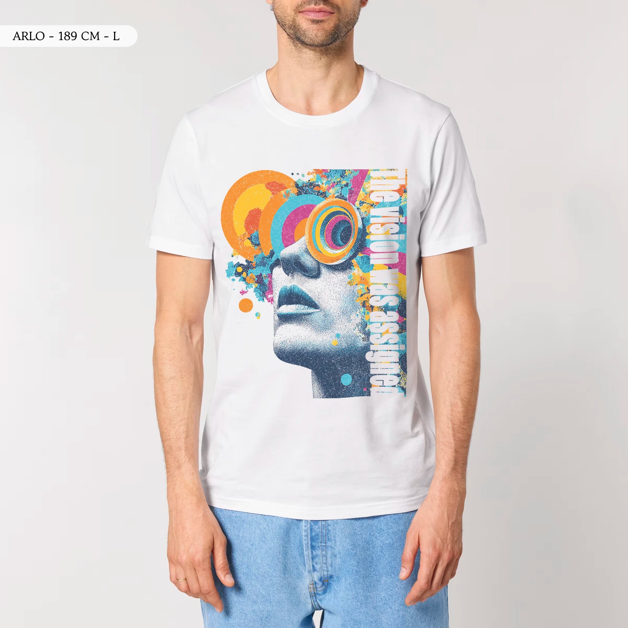 Front view of a male model wearing the TOLS Assigned Vision unisex organic cotton T-shirt in white color.