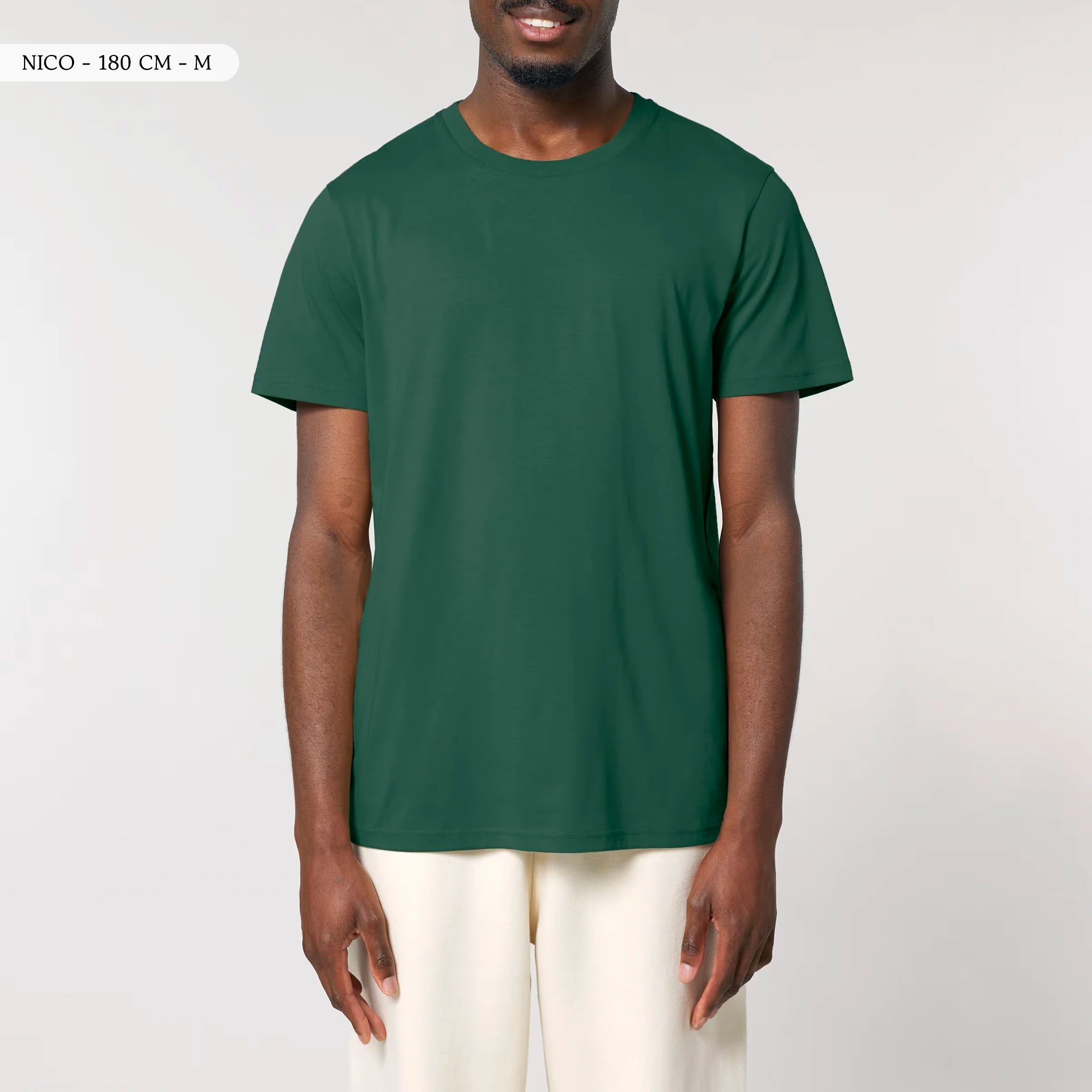 TOLS The Old Ways theme men's unisex medium fit organic cotton T-shirt in Bottle Green, male front - Life on Display